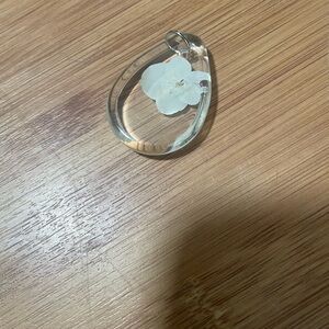Clear Teardrop Pendant with White Flower